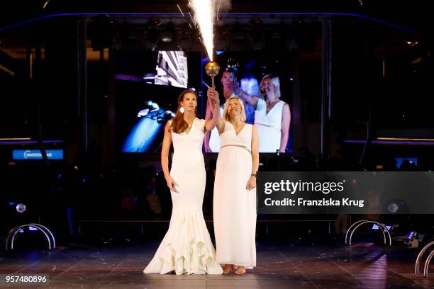 Godmothers Kira Walkenhorst wearing a dress by Lever Couture and Laura Ludwig during the naming ceremony of the cruise ship 'Mein Schiff 1' on May...