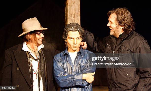 Johnny Depp unveils a statue of Johnny Depp during the Kustendorf film festival on January 13, 2010 in Belgrade, Serbia.