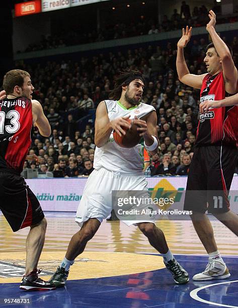 Georgios Printezis, #7 of Unicaja competes with Milko Bjelica, #11 of Lietuvos Rytas in action during the Euroleague Basketball Regular Season...