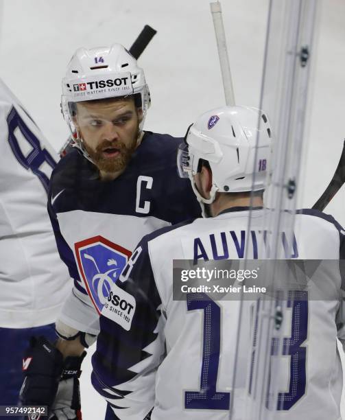 Captain Stephane Da Costa of France celebrate a goal with Yohann Auvitu during the 2018 IIHF Ice Hockey World Championship Group A between Austria...