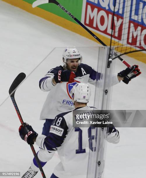 Damien Fleury of France celebrate his first goal with Yohann Auvitu during the 2018 IIHF Ice Hockey World Championship Group A between Austria and...