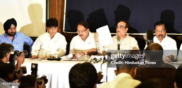 Delhi Congress President Ajay Maken addresses a press conference on CCTV scam against the Delhi Government at Press Club on May 11, 2018 in New...