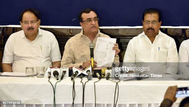 Delhi Congress President Ajay Maken addresses a press conference on CCTV scam against the Delhi Government at Press Club on May 11, 2018 in New...