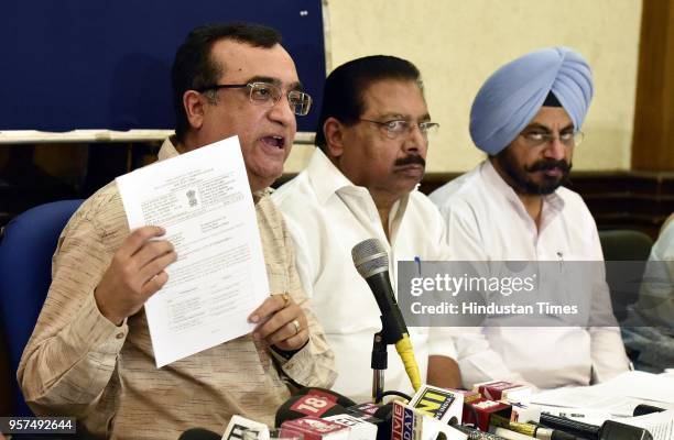 Delhi Congress President Ajay Maken addresses a press conference on CCTV scam against the Delhi Government at Press Club on May 11, 2018 in New...