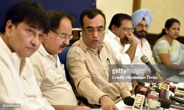 Delhi Congress President Ajay Maken addresses a press conference on CCTV scam against the Delhi Government at Press Club on May 11, 2018 in New...