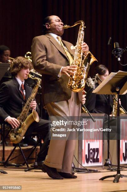 American tenor saxophonist and composer Benny Golson performs with the Juilliard Jazz Orchestra at Alice Tully Hall at Lincoln Center, New York, New...