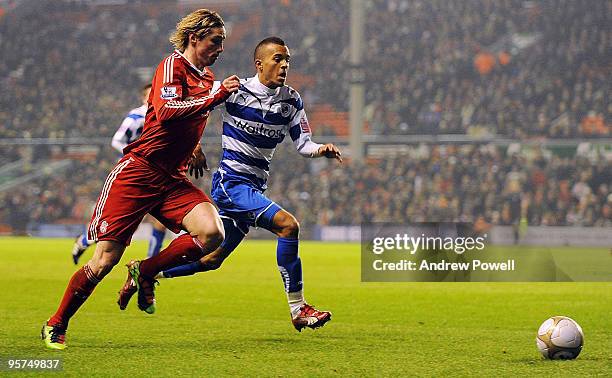 Fernando Torres of Liverpool competes with Ryan Bertrand of Reading during the FA Cup 3rd round replay match between Liverpool and Reading at...