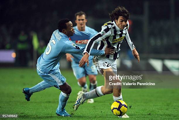 Paolo De Ceglie of Juventus FC battles for the ball with Juan Camilo Zuniga of SSC Napoli during the Tim Cup between Juventus FC and SSC Napoli at...