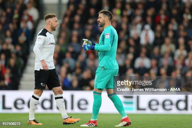 Richard Keogh of Derby County and Scott Carson of Derby County during the Sky Bet Championship Play Off Semi Final:First Leg match between Derby...