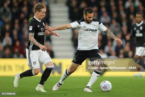 Stefan Johansen of Fulham and Bradley Johnson of Derby County during the Sky Bet Championship Play Off Semi Final:First Leg match between Derby...