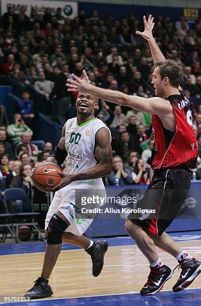 Omar Cook, #00 of Unicaja competes with Vidas Ginevicius, #9 of Lietuvos Rytas warms up before the Euroleague Basketball Regular Season 2009-2010...