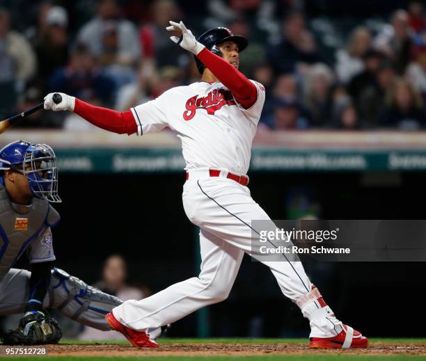 Michael Brantley of the Cleveland Indians hits a grand slam off Jason Hammel of the Kansas City Royals during the fourth inning at Progressive Field...