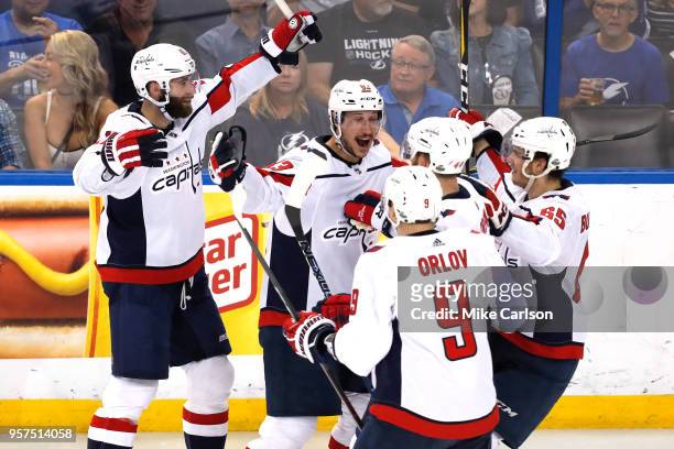 Jay Beagle of the Washington Capitals celebrates with his teammates after scoring a goal against Andrei Vasilevskiy of the Tampa Bay Lightning during...