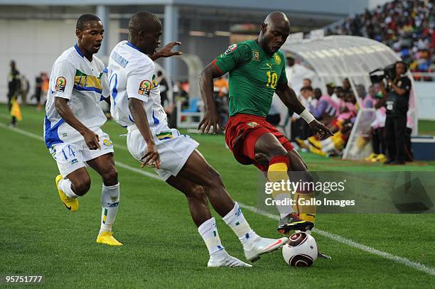 Arsene Copa and Arsene do Marcolino of Gabon challenge Achille Emana of Cameroon during the Africa Cup of Nations match between Cameroon and Gabon...