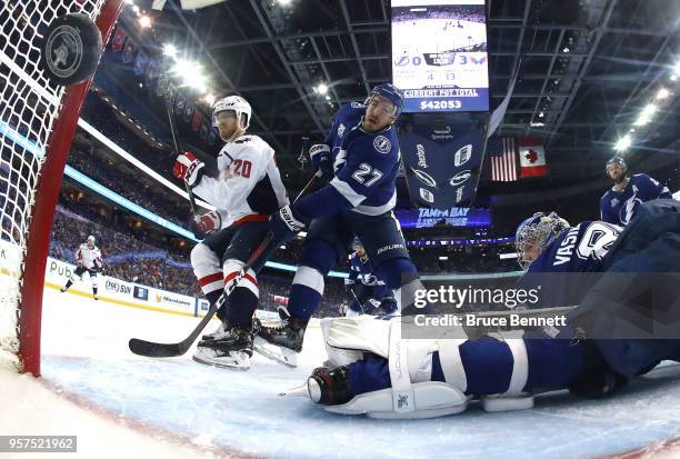 Lars Eller of the Washington Capitals scores a goal against Andrei Vasilevskiy of the Tampa Bay Lightning during the second period in Game One of the...