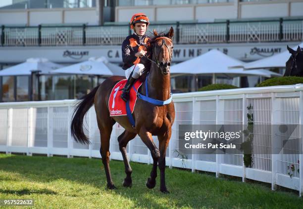Chris Caserta returns to the mounting yard on Rock Hard after winning Ladbrokes Back Yourself Plate ,at Caulfield Racecourse on May 12, 2018 in...