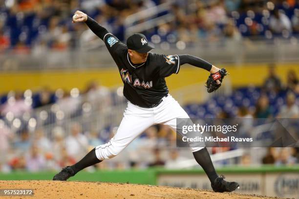 Brad Ziegler of the Miami Marlins delivers a pitch in the ninth inning against the Atlanta Braves at Marlins Park on May 11, 2018 in Miami, Florida.