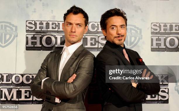 Actors Jude Law and Robert Downey Jr attend the "Sherlock Holmes" premiere at Kinepolis cinema on January 13, 2010 in Madrid, Spain.