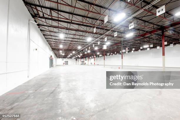 empty warehouse hdr - for lease sign bildbanksfoton och bilder