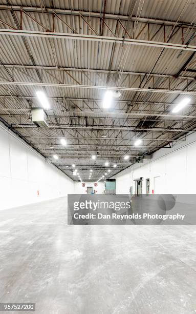 empty warehouse hdr - for lease sign bildbanksfoton och bilder