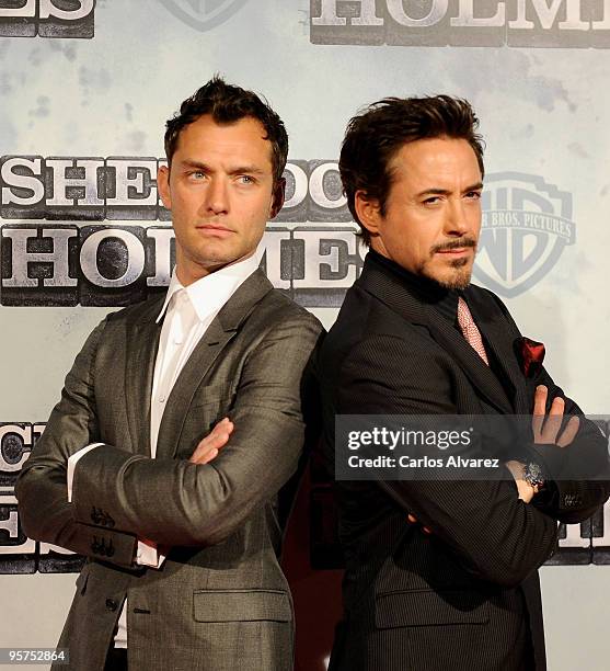 Actors Jude Law and Robert Downey Jr attend the "Sherlock Holmes" premiere at Kinepolis cinema on January 13, 2010 in Madrid, Spain.