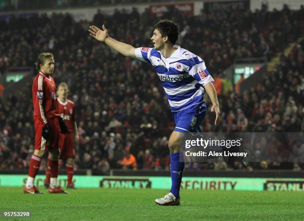 Shane Long of Reading celebrates scoring his team's second goal during the FA Cup sponsored by E.ON 3rd Round Replay match between Liverpool and...