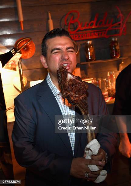 Buddy V's Ristorante owner and chef Buddy Valastro takes a bite during the 12th annual Vegas Uncork'd by Bon Appetit Grand Tasting event presented by...