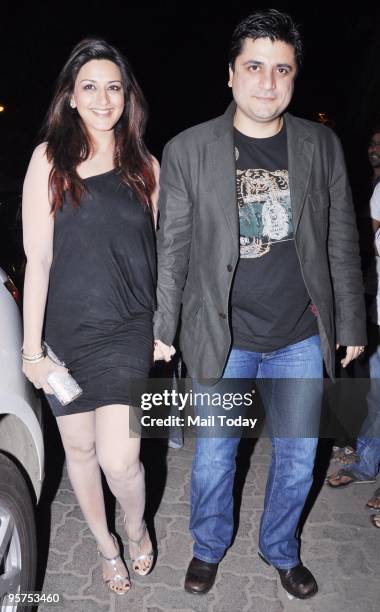 Sonali Bendre with husband Goldie Behl at Hrithik Roshan's birthday party in Mumbai on January 10, 2010.