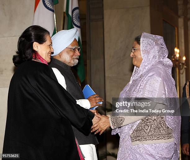 Sheikh Hasina with Sonia Gandhi and Manmohan Singh at Indira Gandhi award ceremony programme in New Delhi on Tuesday, January 12, 2010.