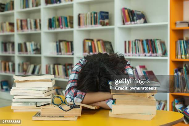 student sleeping on books - toughness stock pictures, royalty-free photos & images