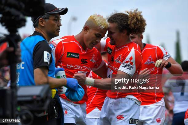Hosea Saumaki of the Sunwolves celebrates scoring his side's third try with his team mates during the Super Rugby match between Sunwolves and Reds at...