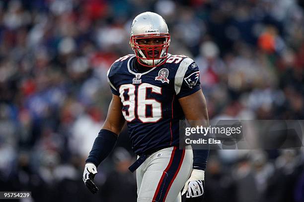 Adalius Thomas of the New England Patriots looks on against the Baltimore Ravens during the 2010 AFC wild-card playoff game at Gillette Stadium on...