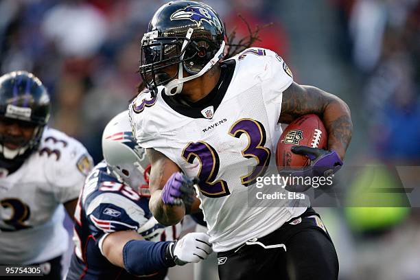 Willis McGahee of the Baltimore Ravens runs the ball against the New England Patriots during the 2010 AFC wild-card playoff game at Gillette Stadium...