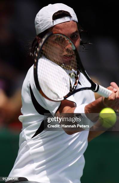 Albert Montanes of Spain plays a forehand during his quarter final match against Michael Lammer of Switzerland at ASB Tennis Centre on January 14,...