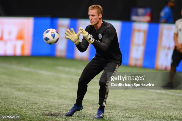 Kansas City goalkeeper Tim Melia warms up prior to the start of the match between Atlanta United and Kansas City on May 9, 2018 at Mercedes-Benz...