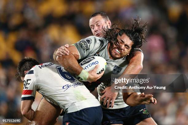 Tohu Harris of the Warriors runs into Luke Keary of the Roosters during the round 10 NRL match between the New Zealand Warriors and the Sydney...