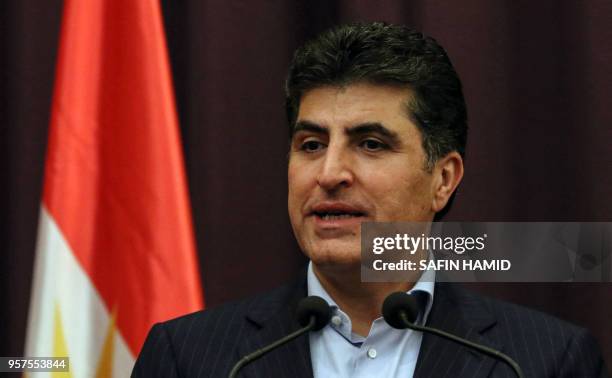 Nechirvan Barzani, Prime Minister of Iraq's autonomous Kurdistan Regional Government , speaks at a press conference after having cast his vote, in...