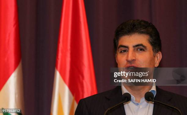 Nechirvan Barzani, Prime Minister of Iraq's autonomous Kurdistan Regional Government , speaks at a press conference after having cast his vote, in...