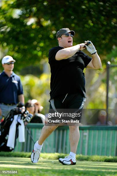 Actor Kevin James reacts to his drive from the first tee box during the Pro-Am round for the Sony Open in Hawaii held at Waialae Country Club on...