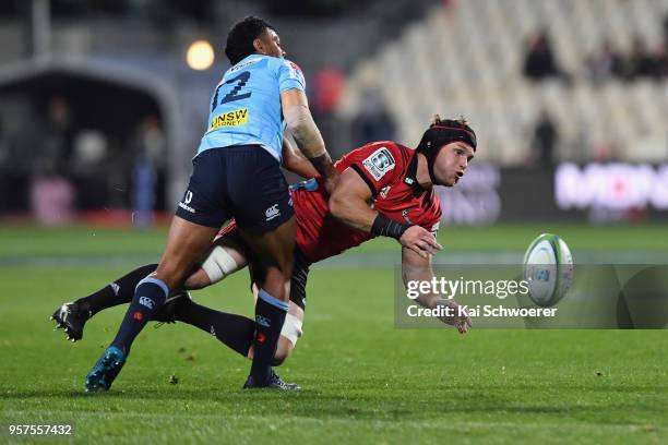 Matt Todd of the Crusaders is tackled during the round 12 Super Rugby match between the Crusaders and the Waratahs at AMI Stadium on May 12, 2018 in...