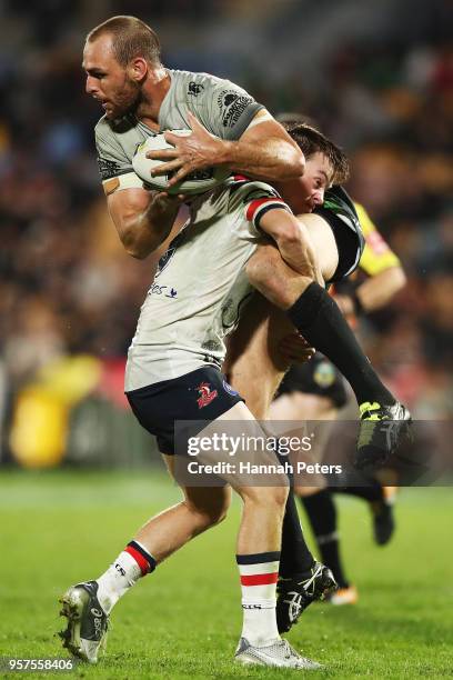 Luke Keary of the Roosters tackles Simon Mannering of the Warriors during the round 10 NRL match between the New Zealand Warriors and the Sydney...