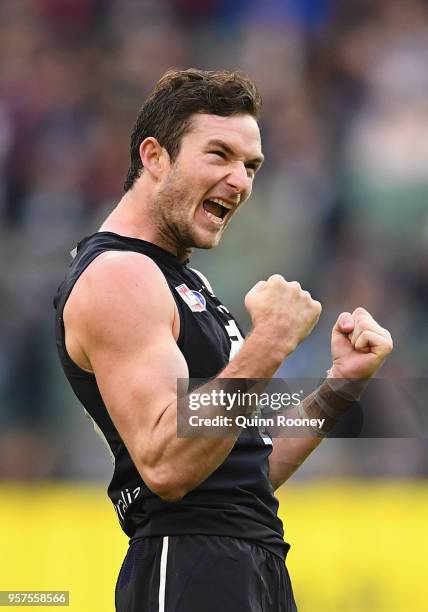 Jed Lamb of the Blues celebrates kicking a goal during the round eight AFL match between the Carlton Blues and the Essendon Bombers at Melbourne...