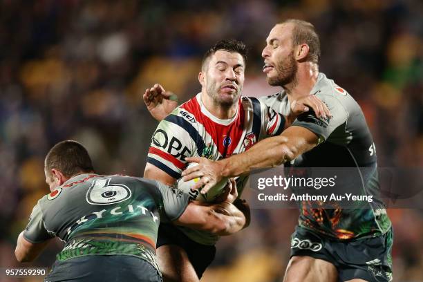 James Tedesco of the Roosters on the charge against Simon Mannering of the Warriors during the round 10 NRL match between the New Zealand Warriors...