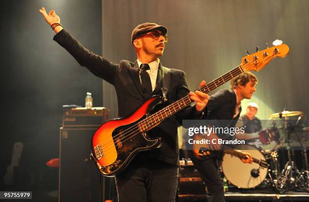 Tim Nordwind, Damian Kulash and Dan Konopka of OK Go perform on stage at Shepherds Bush Empire on January 13, 2010 in London, England.