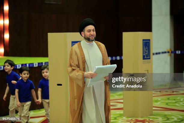 Shi'ite leader Ammar al-Hakim casts his vote for the Iraqi parliamentary election in Baghdad, Iraq on May 12, 2018.