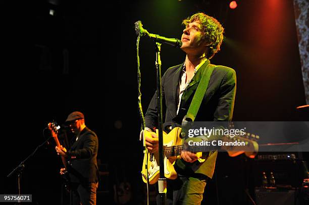 Tim Nordwind and Damian Kulash of OK Go perform on stage at Shepherds Bush Empire on January 13, 2010 in London, England.