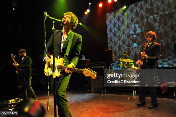 Tim Nordwind, Damian Kulash and Andy Ross of OK Go perform on stage at Shepherds Bush Empire on January 13, 2010 in London, England.