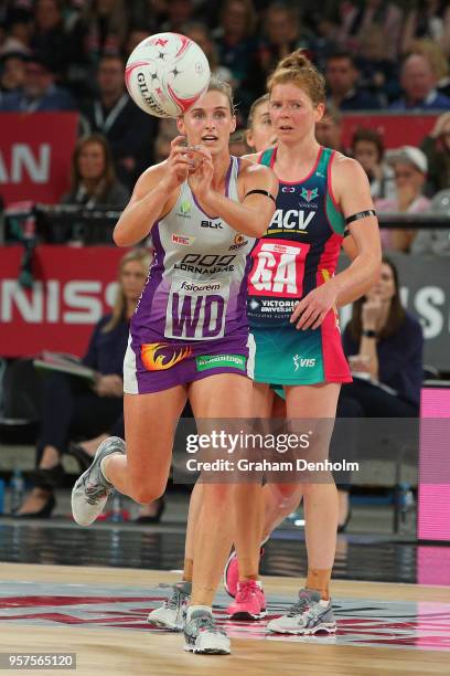 Gabi Simpson of the Firebirds passes during the round three Super Netball match between the Vixens and the Firebirds at Hisense Arena on May 12, 2018...