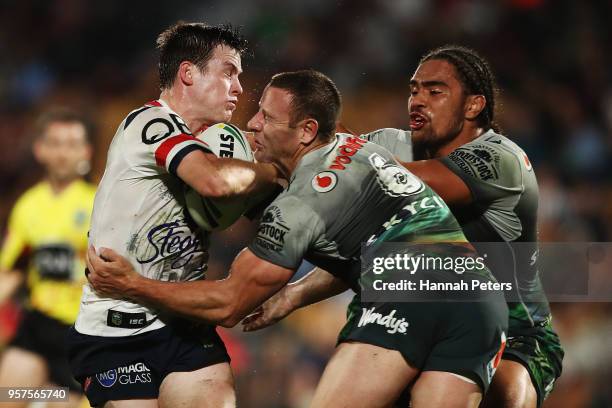 Luke Keary of the Roosters is tackled by Blake Green of the Warriors during the round 10 NRL match between the New Zealand Warriors and the Sydney...