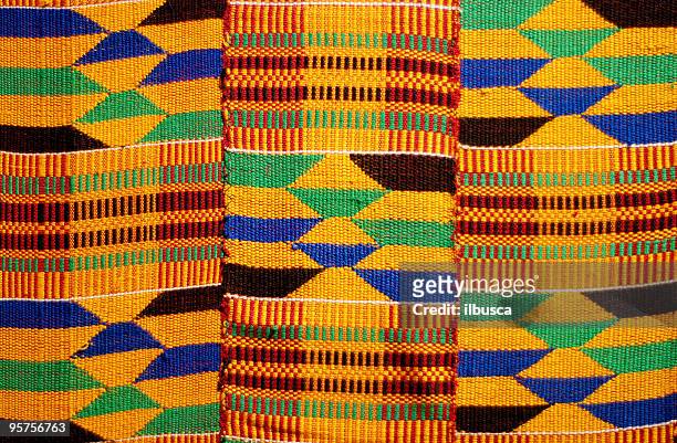 african colored pattern fabric background - africa stock pictures, royalty-free photos & images